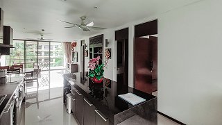 Kitchen area with a bar counter
