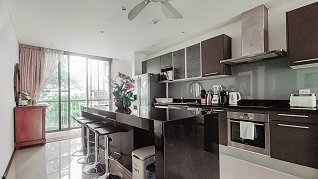 Kitchen area with a bar counter